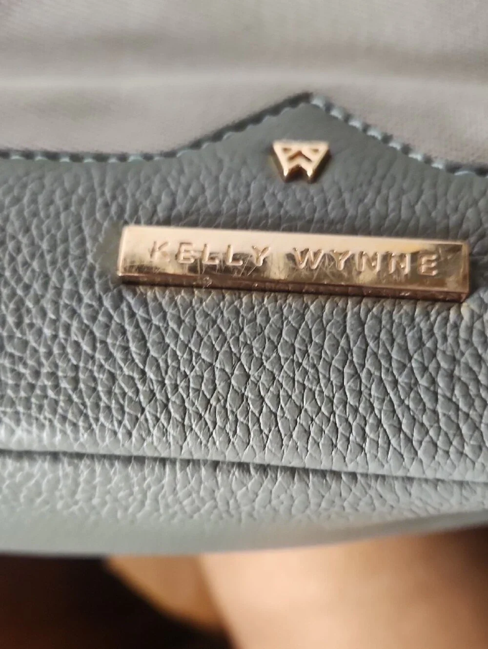 Kelly Wynne stylish grey